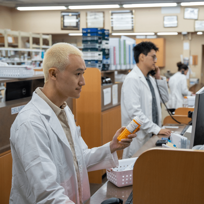 Pharmacist reviewing a prescription